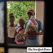 Guillermo Beltran and his daughters Chanely and Chanela pictured mid-February as they received Mexican humanitarian assistance.