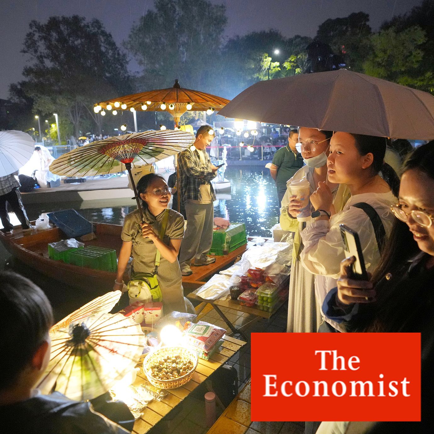 A woman sells umbrellas at Shougang park on the Mid-Autumn Festival in Beijing, Friday, Sept. 25, 2026.