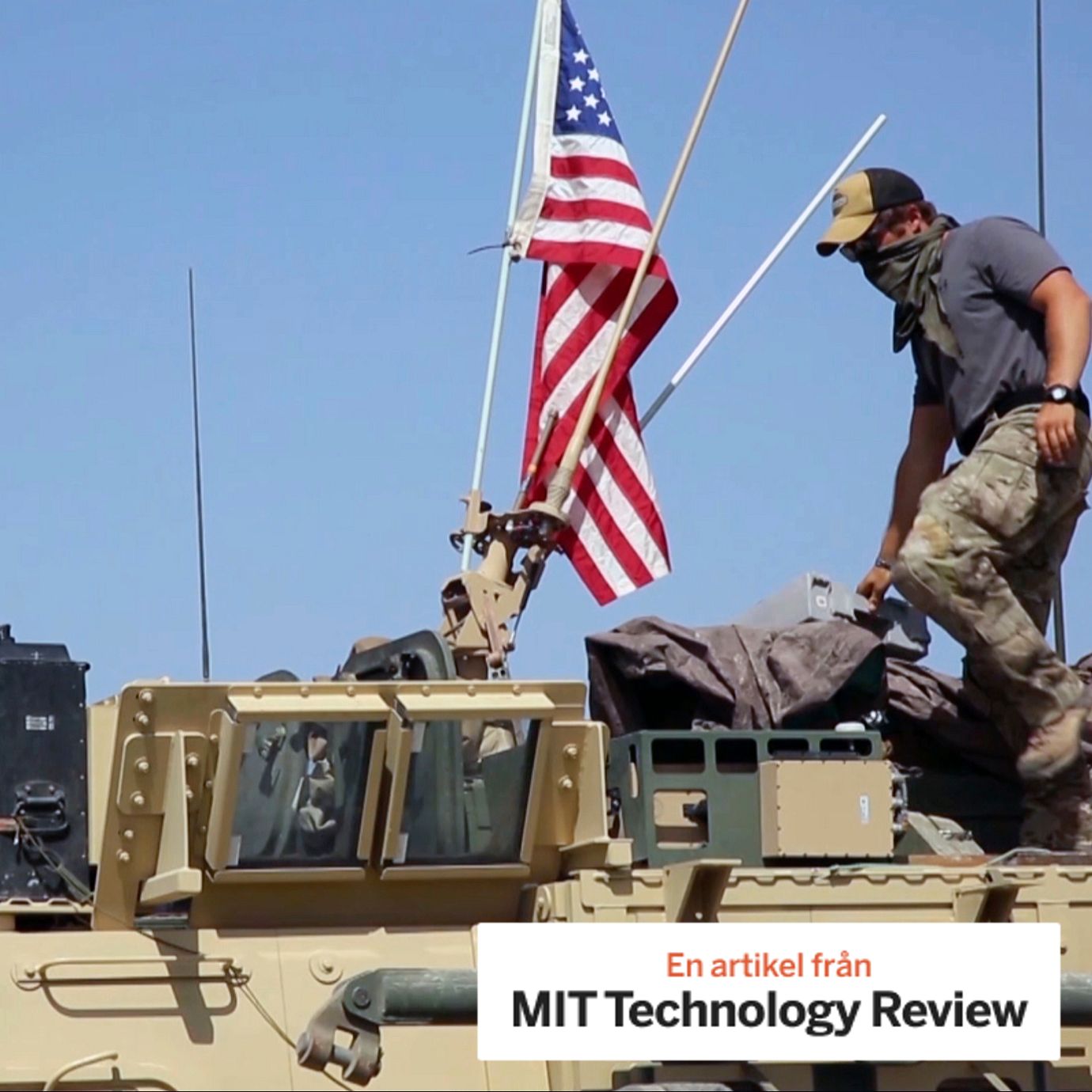 This Saturday, April. 29, 2017 still taken from video, shows an American soldier standing on an armored vehicle in the northern village of Darbasiyah, Syria.