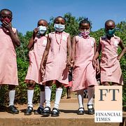 Pupils walk around the school compound during break time at Kitante Primary School in Kampala, Uganda Monday, Jan. 10, 2022.