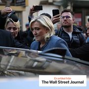 Marine Le Pen leaves the National Rally headquarters on Monday after her conviction on embezzlement charges.