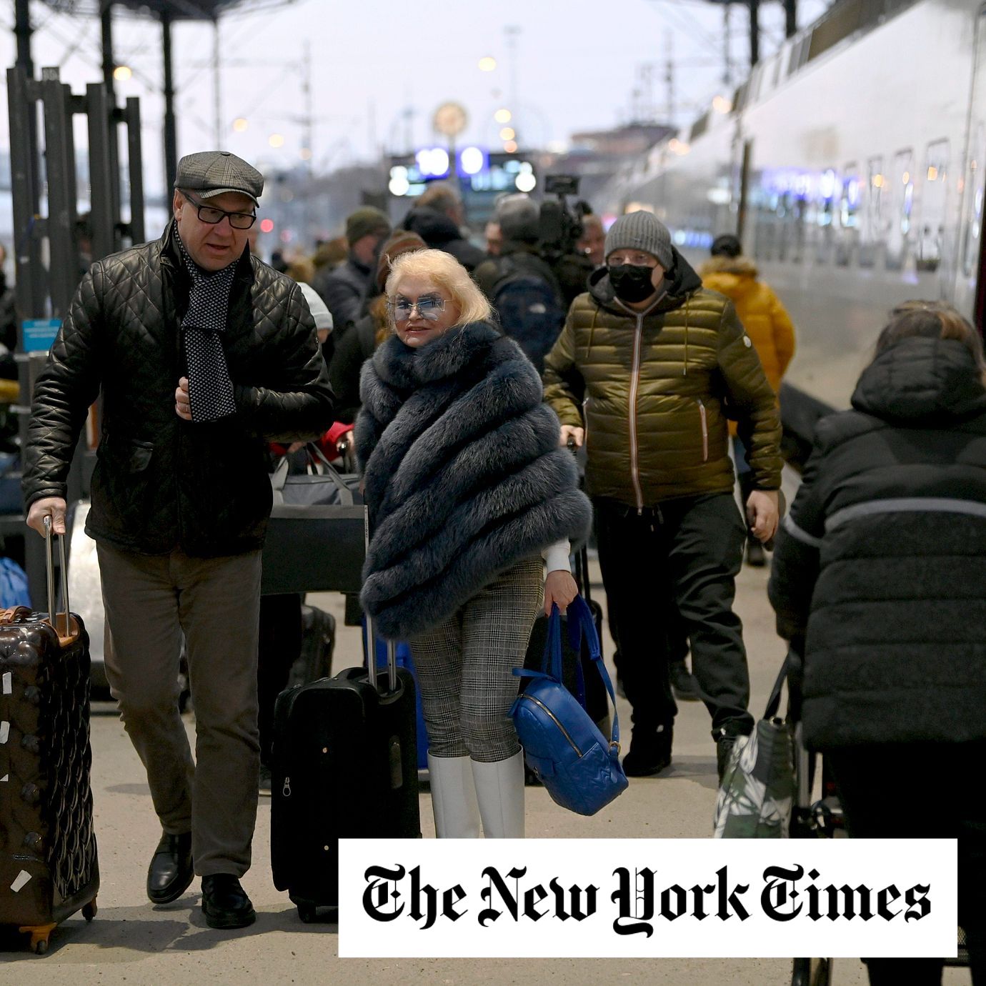 People get off the Allegro train that arrived in the evening from St. Petersburg, Russia, to the central railway station in Helsinki, Finland, Friday, March 4, 2022.