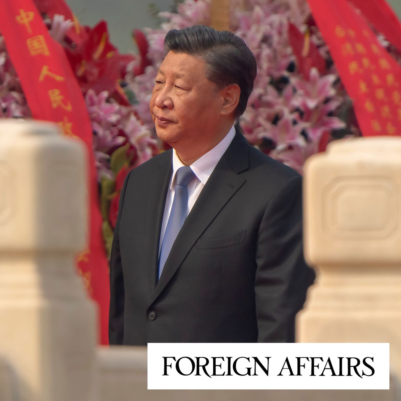 Chinese President Xi Jinping walks past floral bouquets during a ceremony to mark Martyr's Day at the Monument to the People's Heroes at Tiananmen Square in Beijing, Friday, Sept. 30, 2022.
