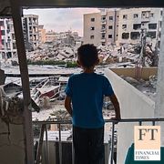A boy looks through a damaged room of the Jabal Amel Hospital into a destroyed building that was hit in an Israeli airstrike in the southern port city of Tyre, Lebanon, June 1, 2026.