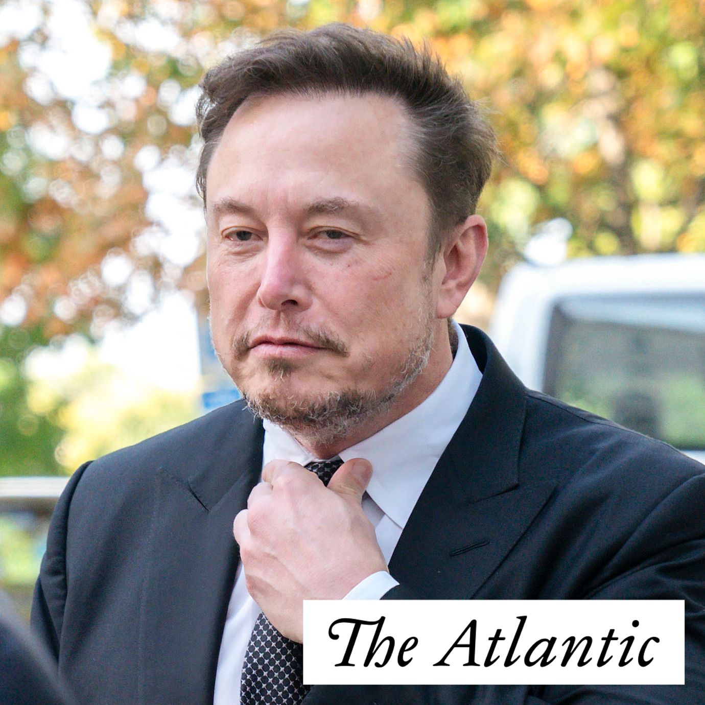 Elon Musk, CEO of X, the company formerly known as Twitter, tightens his tie as he arrives for a closed-door gathering of leading tech CEOs to discuss the priorities and risks surrounding artificial intelligence and how it should be regulated, at Capitol Hill in Washington, Wednesday, Sept. 13, 2023.