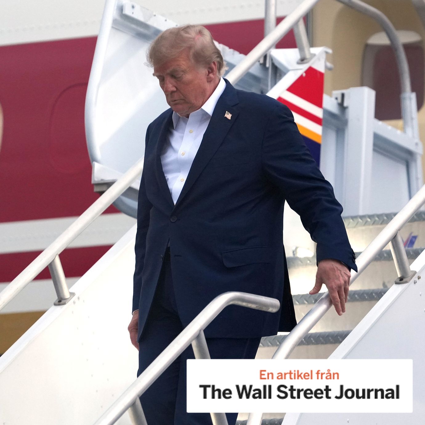 President Donald Trump steps off Air Force One.