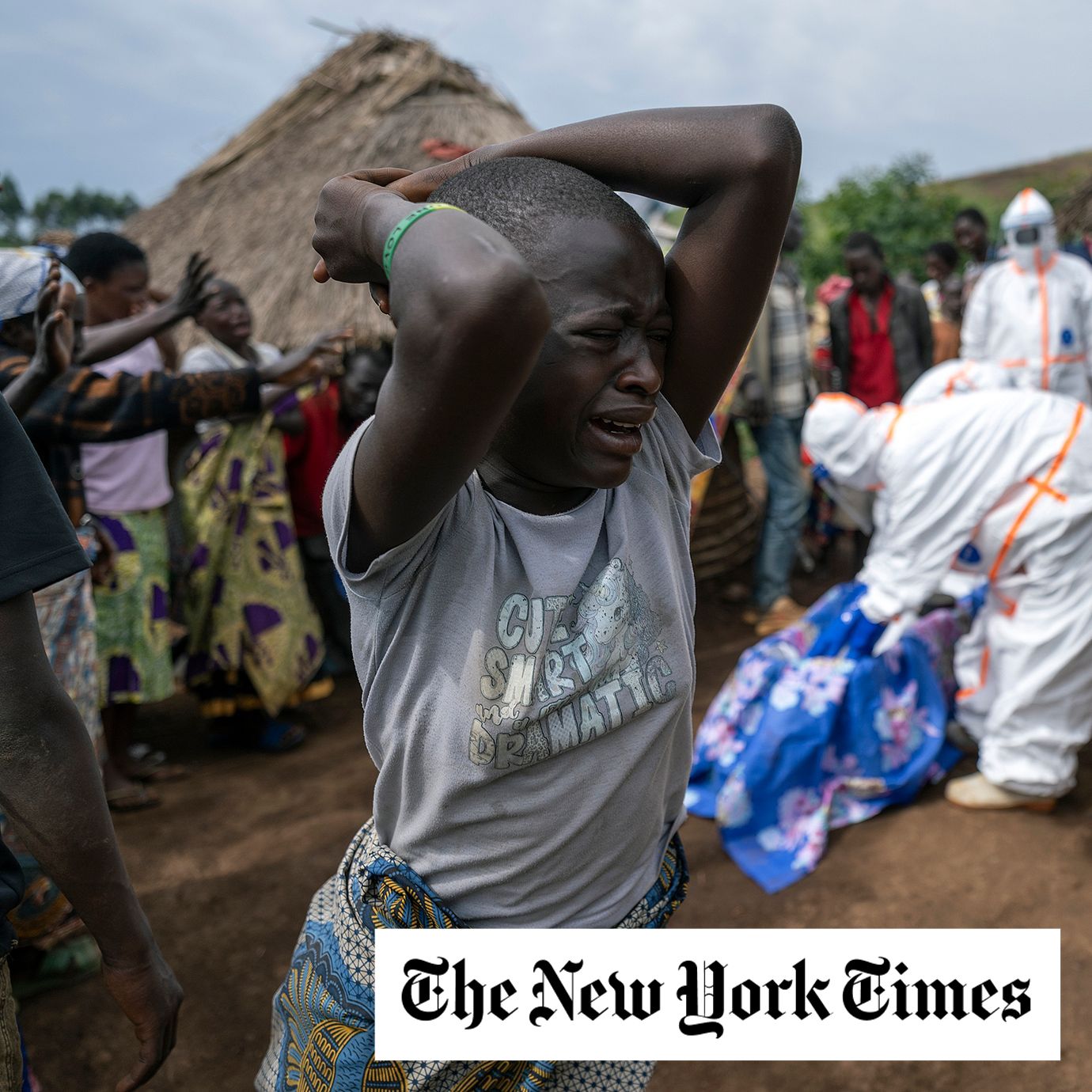 A child reacts as the body of Josué Ddirokpa, 7, is taken away by health workers for burial in Mangala, Democratic Republic of Congo. At least 200 people have died in nine villages near Mangala.