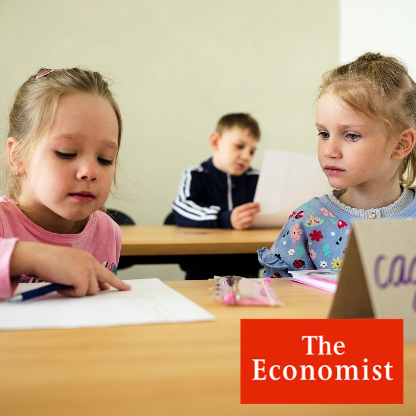 Two children attend a class for refugees from the Ukraine in Berlin, Germany, Monday, March 21, 2022