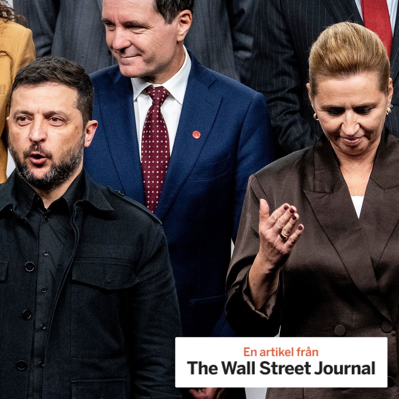 Ukraine's President Volodymyr Zelenskyy and Danish Prime Minister Mette Frederiksen leave after a family photo during a meeting of the European Political Community (EPC) in Copenhagen.
