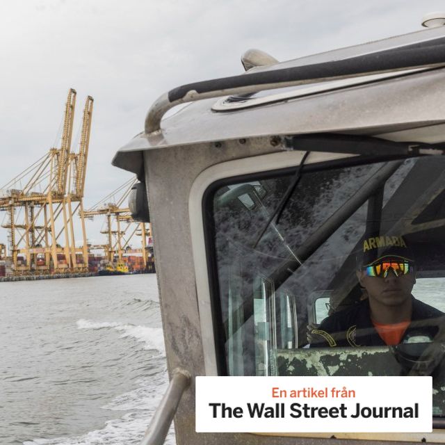 A Colombian Navy patrol boat searches for cocaine at the port of Buenaventura.