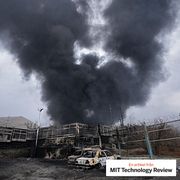 A thick plume of smoke rises from an oil storage facility hit by a U.S.-Israeli strike in Tehran, Iran, March 8, 2026.