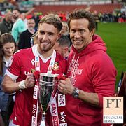 Wrexham’s co-owner and film star Ryan Reynolds with player Sam Smith. Americans now own 117 European clubs, according to data from CIES Sports Intelligence.