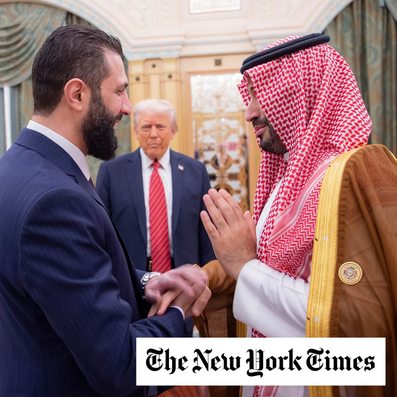 Syria's interim President Ahmad al-Sharaa shake hands with Saudi Crown Prince Mohammed bin Salman as US President Donald Trump looks on.