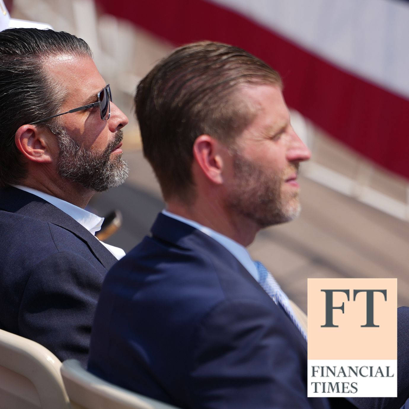 Donald Trump Jr., and Eric Trump listen as President Donald Trump speaks.