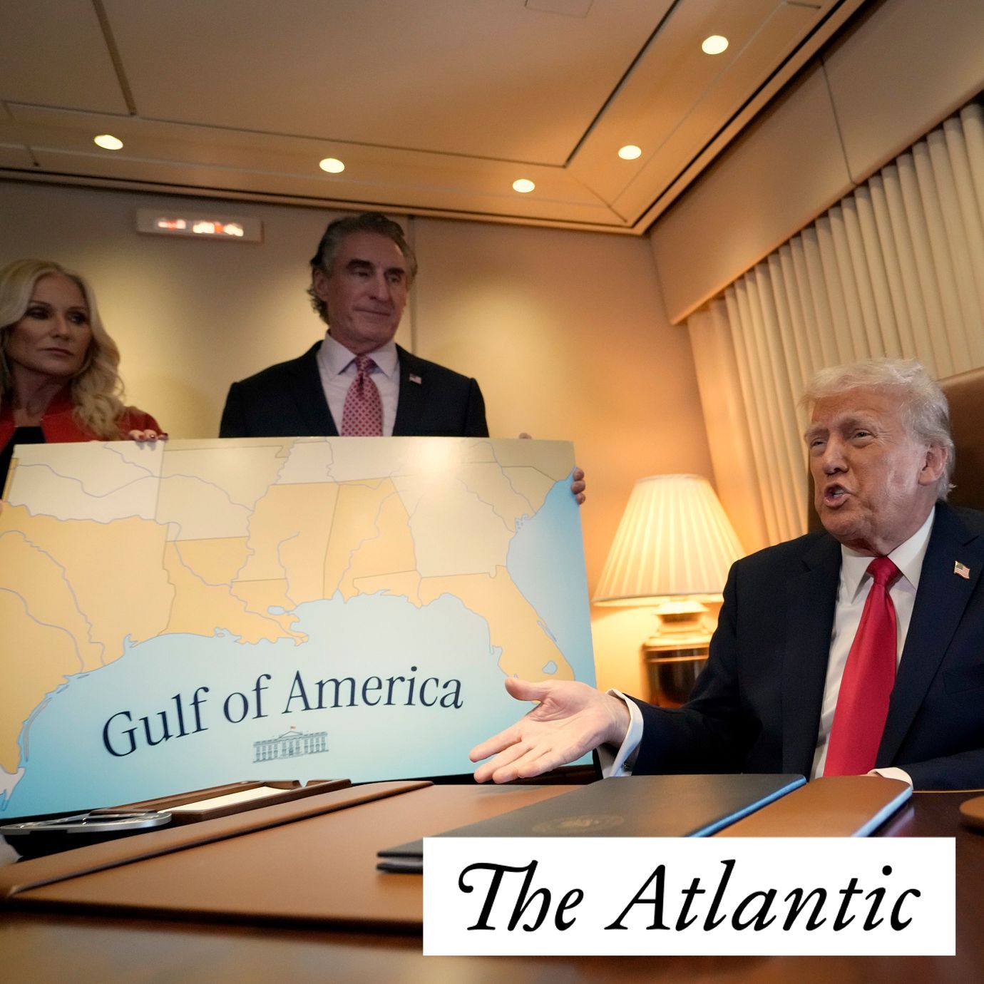 President Donald Trump, from right, speaks to reporters accompanied by Interior Secretary Doug Burgum and Burgum's wife Kathryn Burgum, aboard Air Force One where Trump signed a proclamation declaring Feb. 9 Gulf of America Day, as he travels from West Palm Beach, Fla. to New Orleans, Sunday, Feb. 9, 2025.