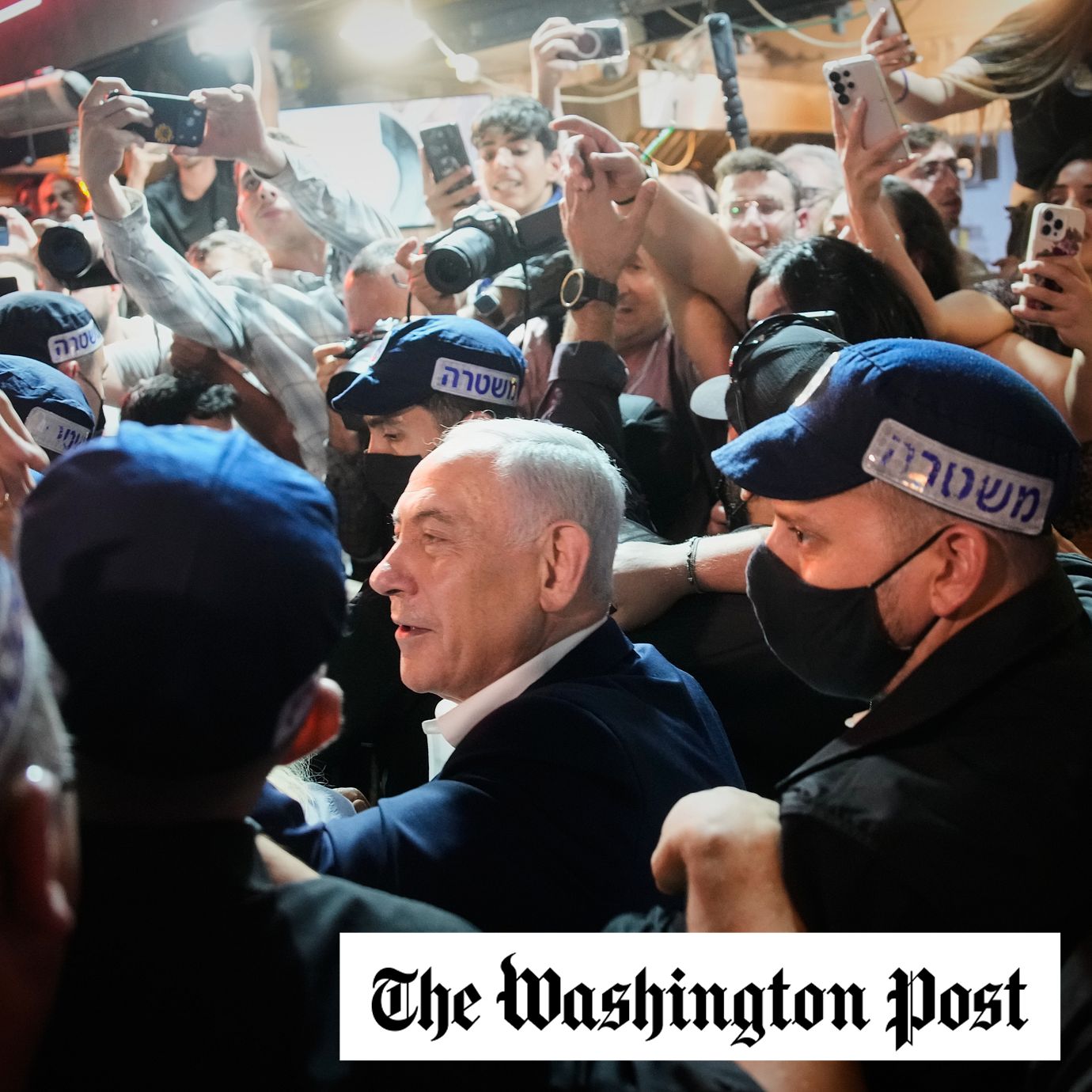 Israeli Prime Minister and Likud party leader Benjamin Netanyahu is flanked by security personnel during an election campaign visit to Jerusalem’s Mahane Yehuda Market, Oct. 23, 2026.