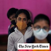 Indian teens wait to receive their vaccination for COVID-19 at a government school, in New Delhi, India, Monday, Jan. 3, 2022.