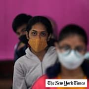 Indian teens wait to receive their vaccination for COVID-19 at a government school, in New Delhi, India, Monday, Jan. 3, 2022.