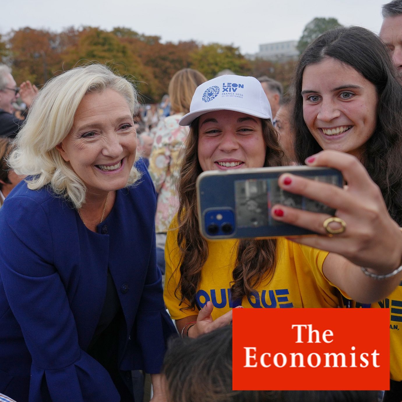 People take a selfie photo with French Far-right leader Marine Le Pen.