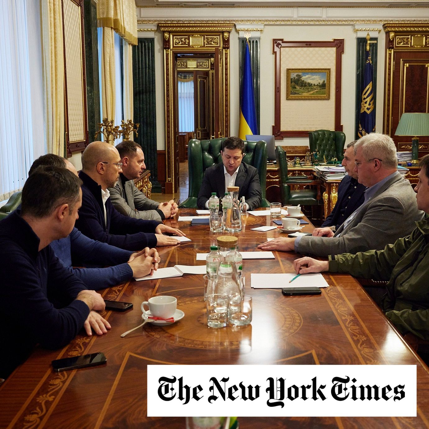 In this handout photo provided by the Ukrainian Presidential Press Office, Ukrainian President Volodymyr Zelenskyy, center, attends an urgent meeting with the leadership of the government, representatives of the defense sector and the economic block in Kyiv, Ukraine, Thursday, Feb. 24, 2022