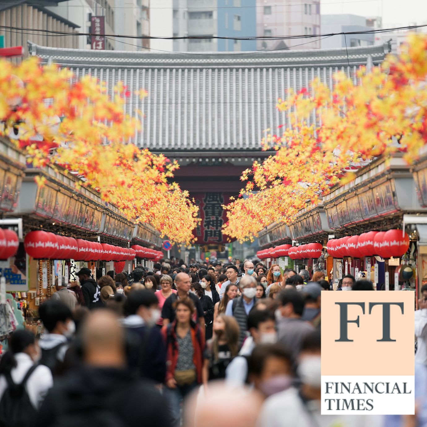 Tourists walk through a promenade lined with souvenir shops leading to the Sensoji Buddhism temple in the famed Asakusa district of Tokyo on Oct. 17, 2022.