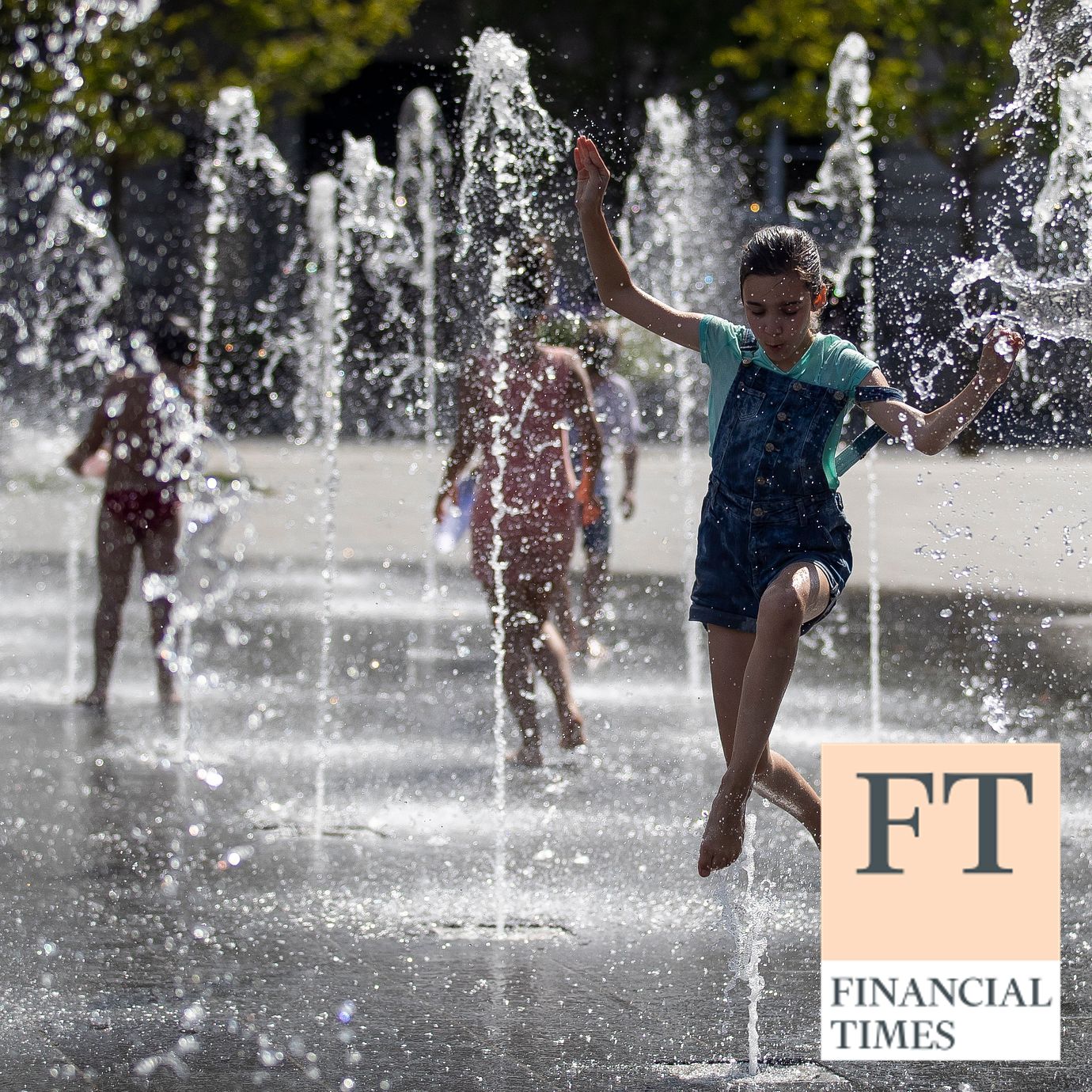 Children cool off in a public fountain in Vilnius, Lithuania.
