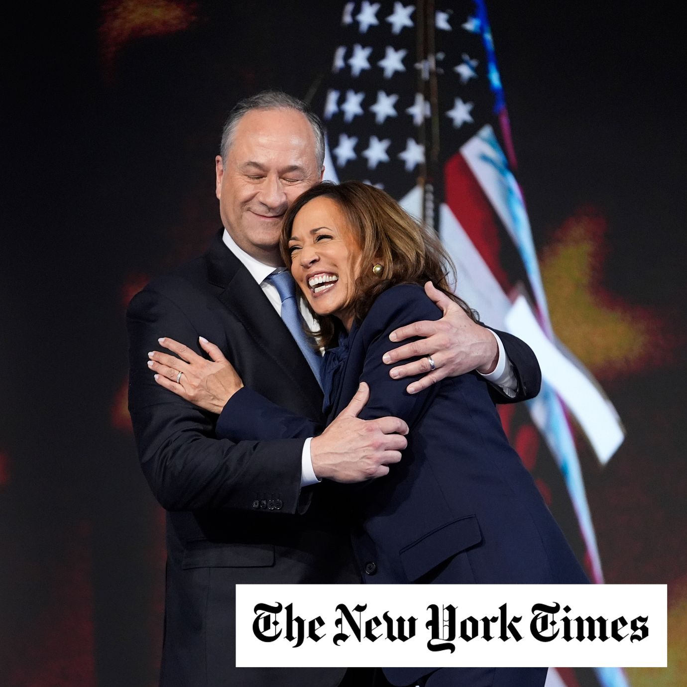 Democratic presidential nominee Vice President Kamala Harris hugs her husband Second gentleman Douglas Emhoff after her nomination speech during the Democratic National Convention Thursday, Aug. 22, 2024, in Chicago.