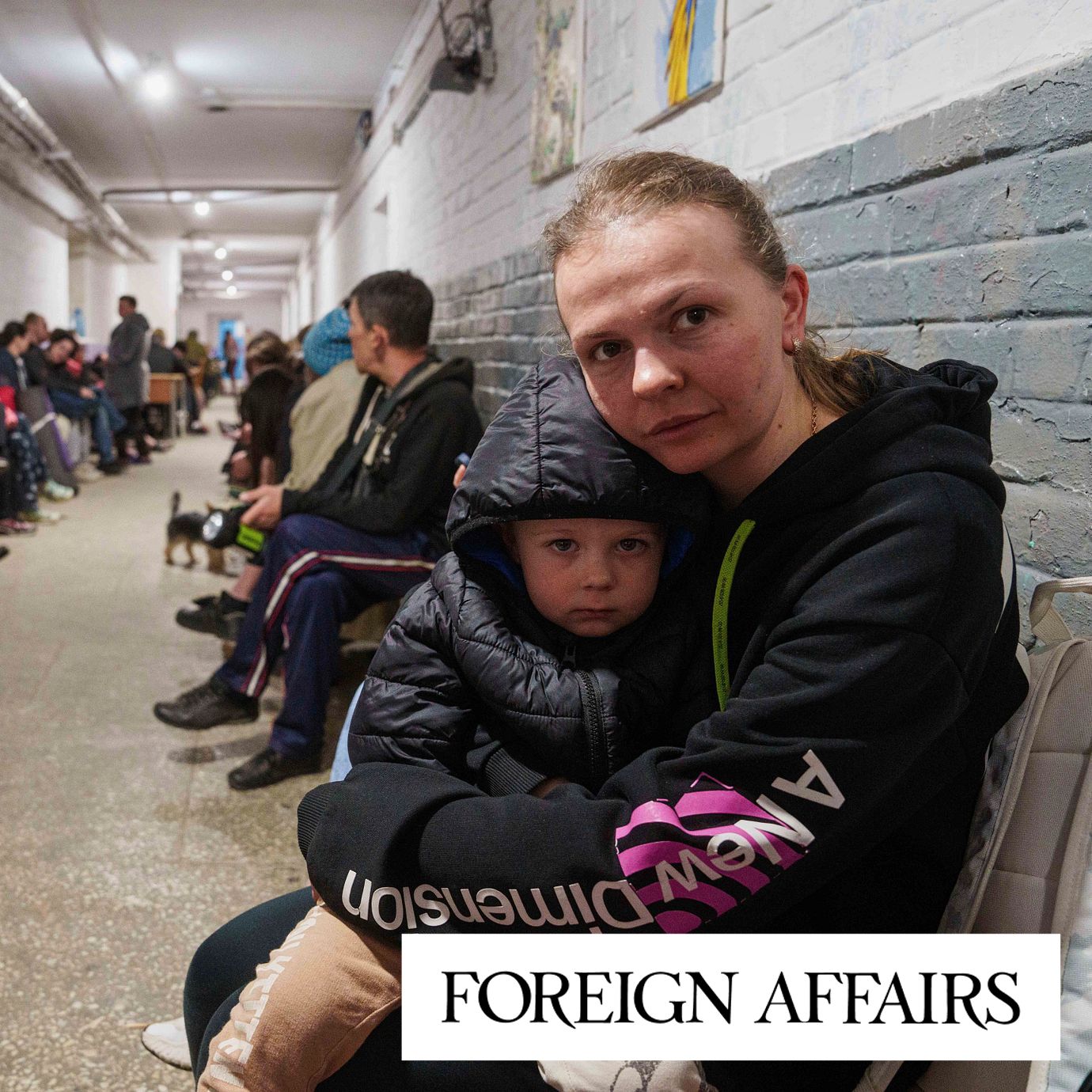 A mother comforts her son in a school basement being used as a shelter after a Russian airstrike on a residential neighborhood in Kyiv, Ukraine, April 24, 2025.