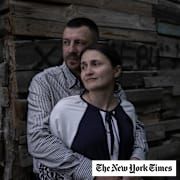Mykola Zakhozhyi, a Ukrainian civilian who was taken by invading Russian forces and held for nearly a year in a series of Russian prisons, with his wife Iryna.