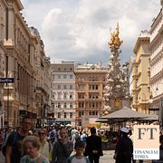 People walk on the shopping street Graben in Vienna.