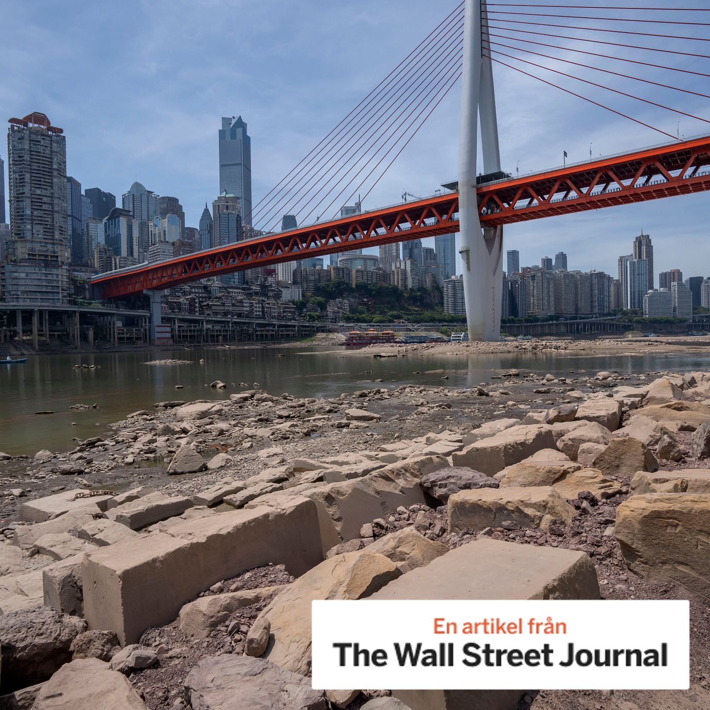 Rocks are exposed on the dry riverbed of the Jialing River in southwestern China's Chongqing Municipality, Friday, Aug. 19, 2022. Ships crept down the middle of the Yangtze on Friday after the driest summer in six decades left one of the mightiest rivers shrunk to barely half its normal width and set off a scramble to contain damage to a weak economy in a politically sensitive year.
