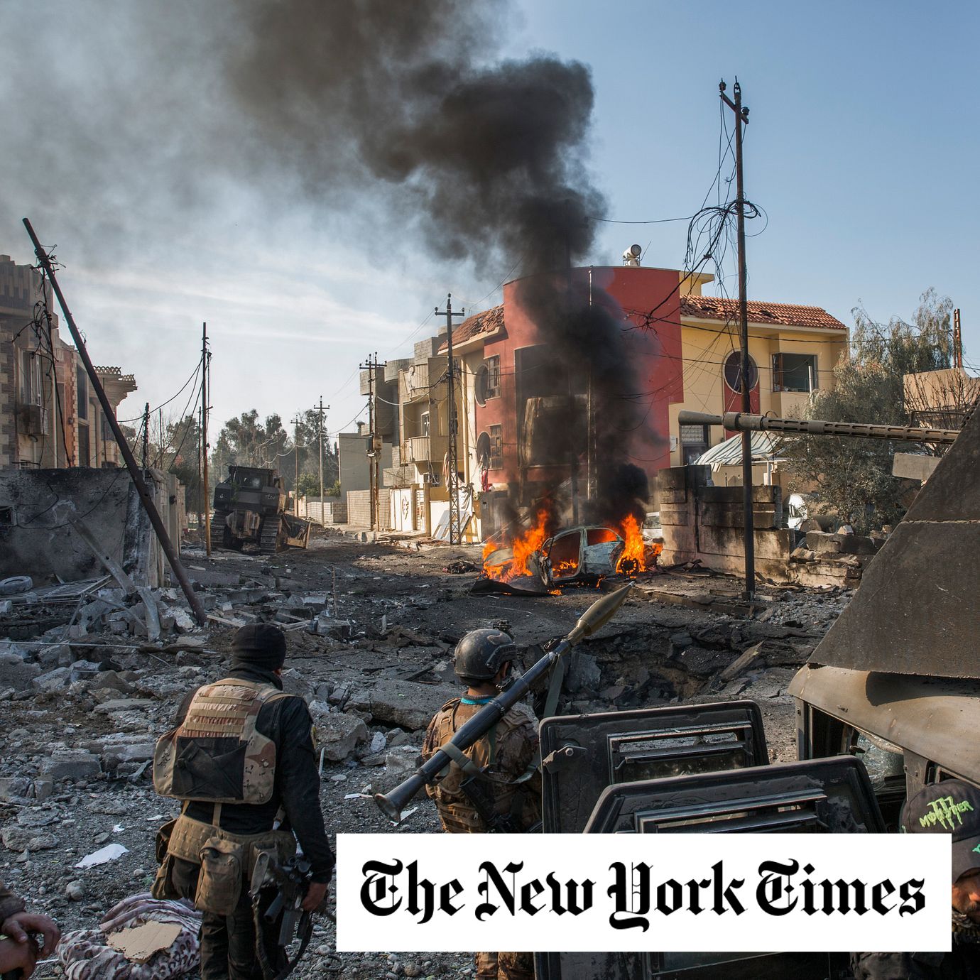 Iraqi soldiers survey the aftermath of an Islamic State suicide bombing in Mosul, Iraq. Some Iraqis are celebrating the end of an American military presence that unleashed waves of bloodshed. Others fear what happens next for their country, trapped between Washington and Tehran.